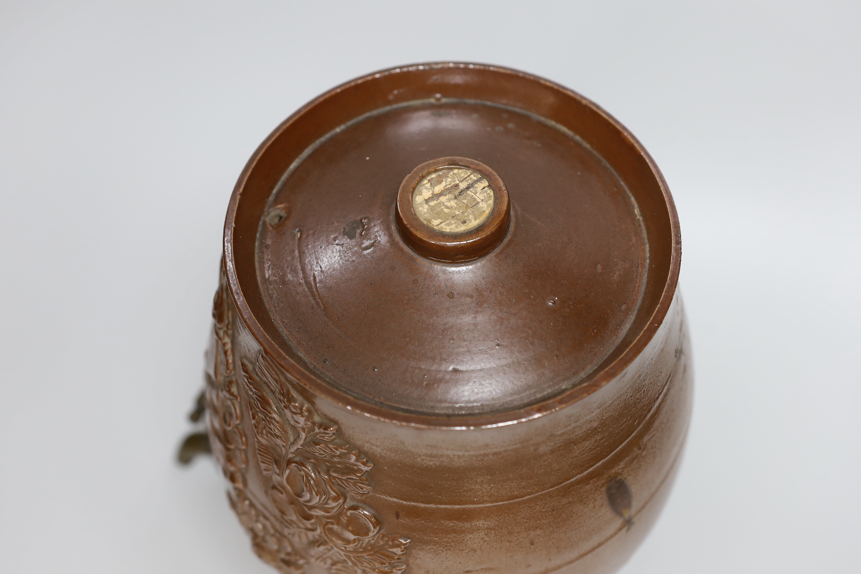 A mid 19th century Brampton brown salt glazed stoneware two gallon spirit barrel, moulded with the arms of the Prince of Wales and his birthday, November 9th 1841, fitted with a brass spigot, 28cm